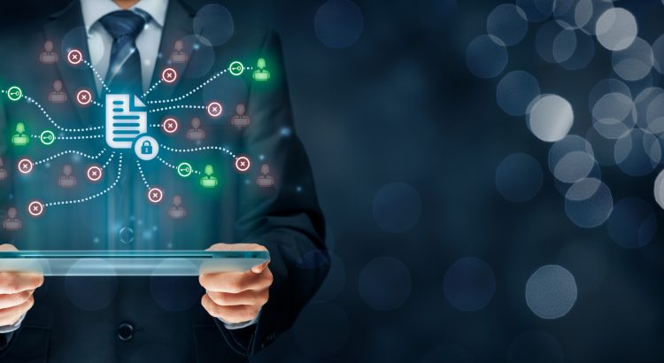 Corporate data management system (DMS) and document management system with privacy theme concept. Businessman or programmer with tablet and scheme with protected document connected with users, access rights symbolized by key.